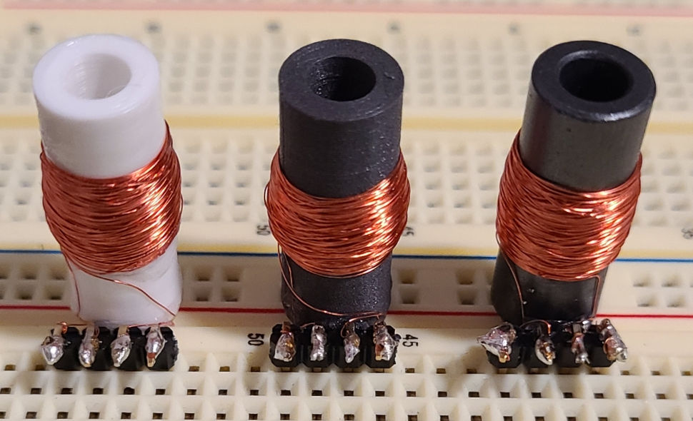Flyback transformers Image showing three flyback transformers made of different materials