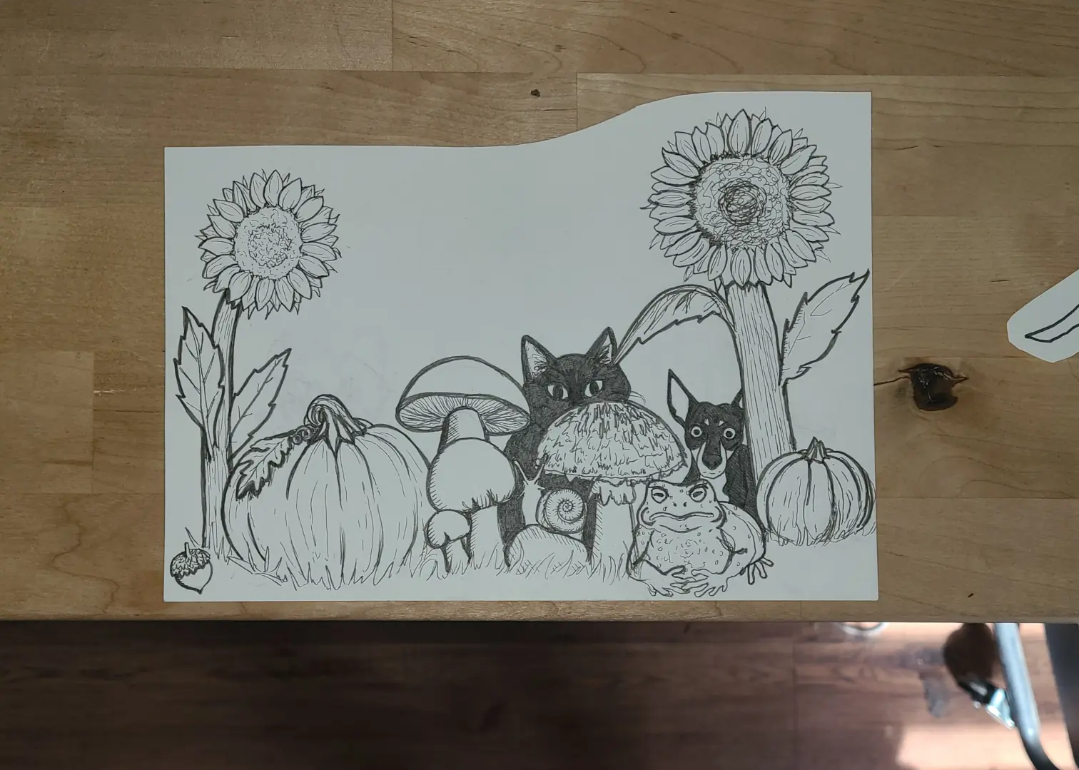 Phone positioned above a drawing on a flat surface Phone positioned above drawing